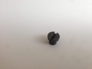 Mounting flange for bearing POM piston head